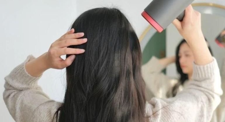 Drying and heat styling tape in hair extensions safely