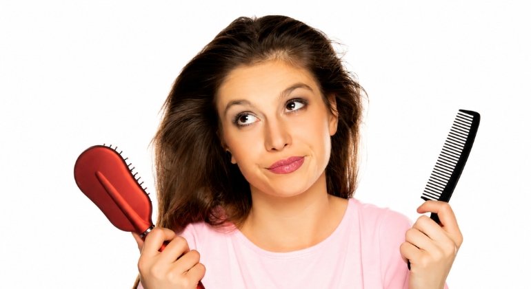 Stop brushing hard, and stop brushing wet hair from the roots