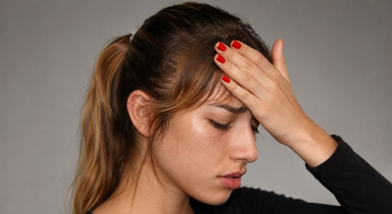 Why does a high ponytail give you a headache